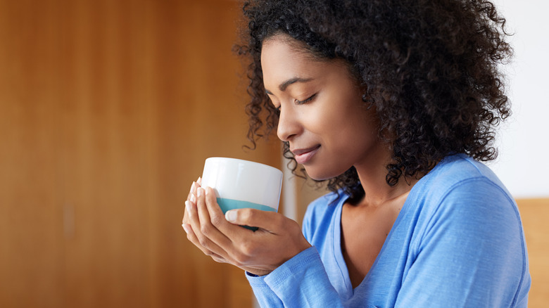 woman drinking coffee