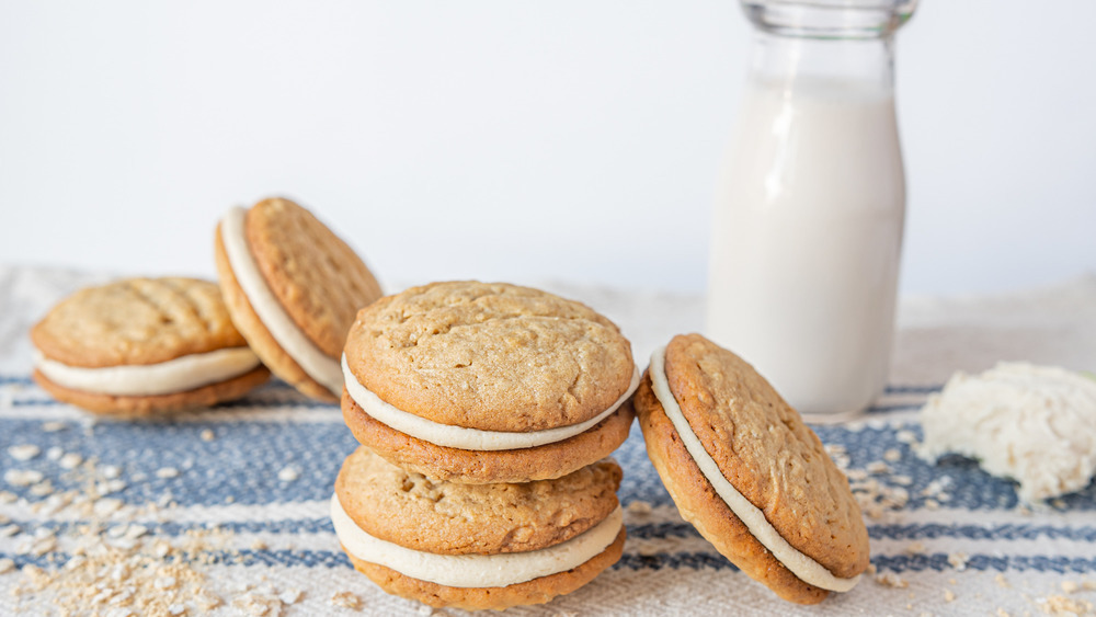 Stack of cookies with bottle of milk