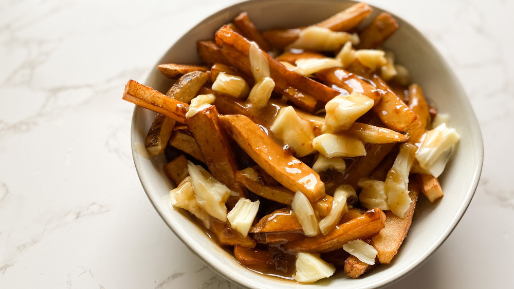 Fries covered in gravy and cheese curds