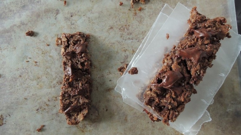 salted dark chocolate granola bars on a baking sheet