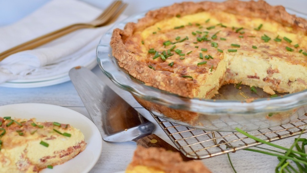 Quiche Lorraine with bacon and cheese topped with chives