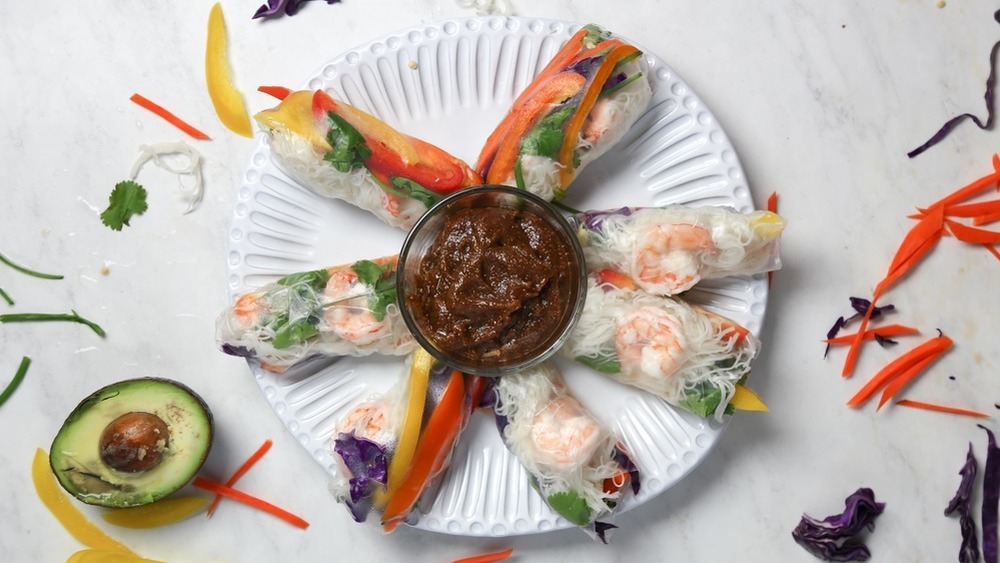 colorful shrimp rolls with sauce 