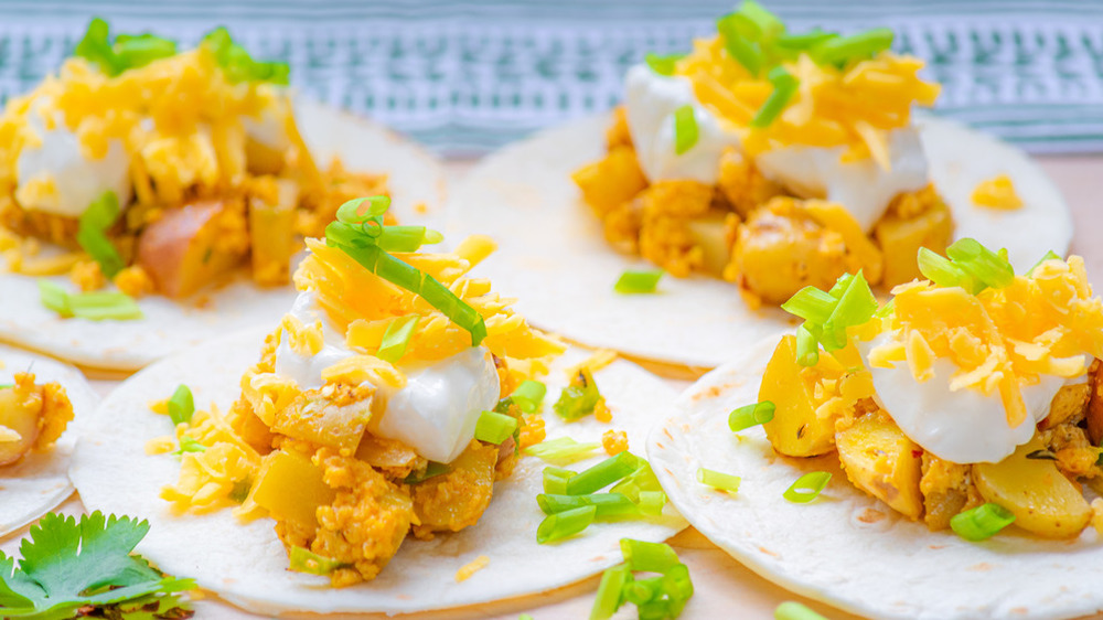 breakfast tacos on a table