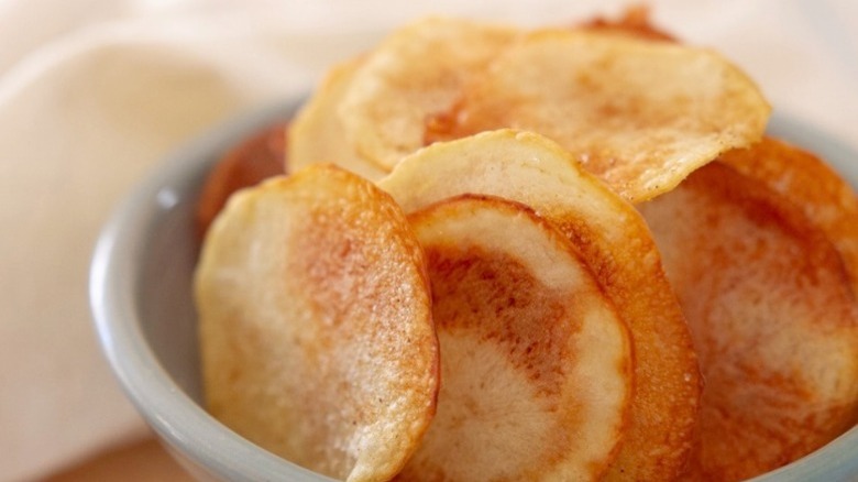 potato chips in white bowl