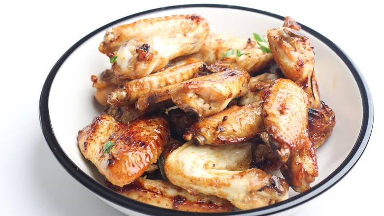 chicken wings in white bowl