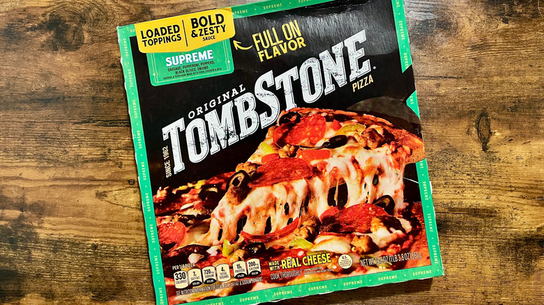 A Tombstone pizza original thin crust supreme pizza box