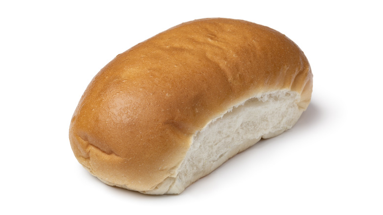 Oblong bread roll on a white background