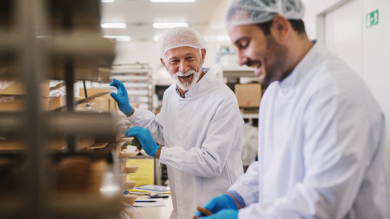 bakers in gloves and hairnets