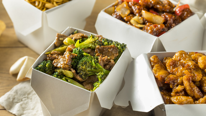 chinese food in takeout boxes