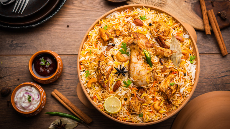 Chicken biryani on wooden table