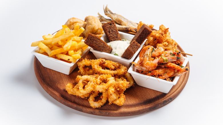 fried seafood on wooden platter