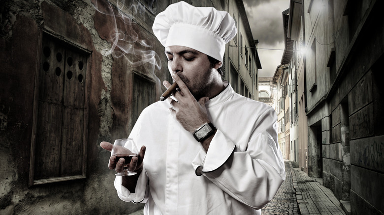 Chef smoking and drinking