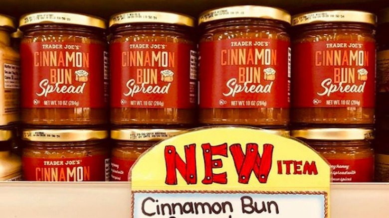 cinnamon bun spread jars on a shelf at trader joe's