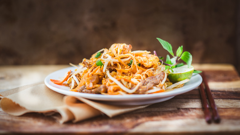 Pad Thai on a brown background