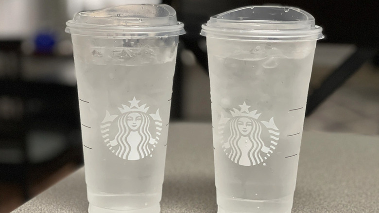 two cups of starbucks ice water