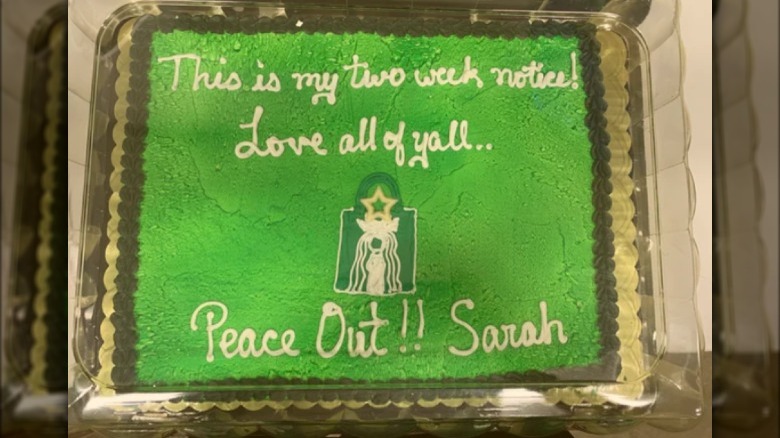 Green sheet cake with Starbucks logo and words