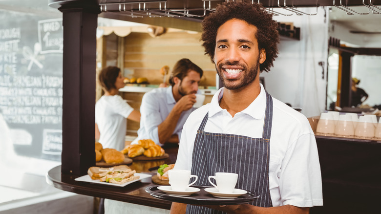 Restaurant server with tray