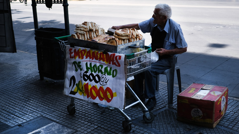 Chilean street vendor selling empanadas 