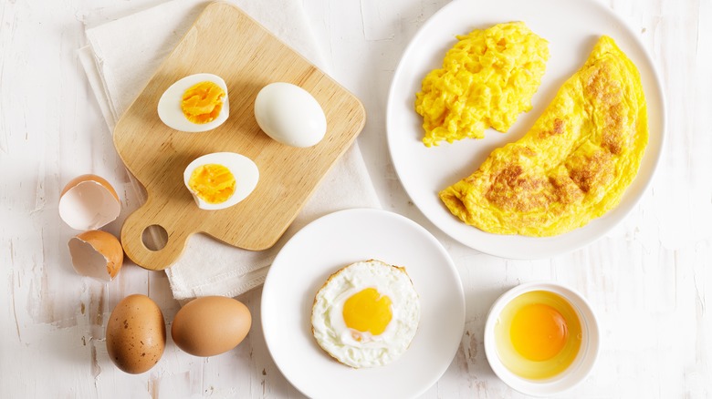 scrambled fried and whole eggs