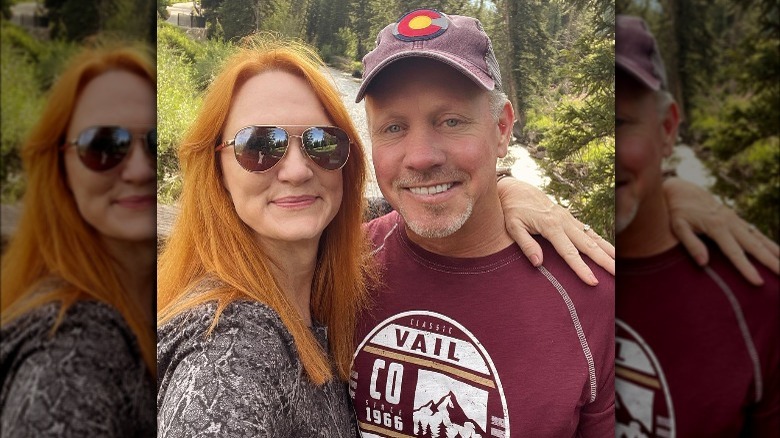 An Instagram photo of Ree Drummond and her husband Ladd surrounded by nature and greenery