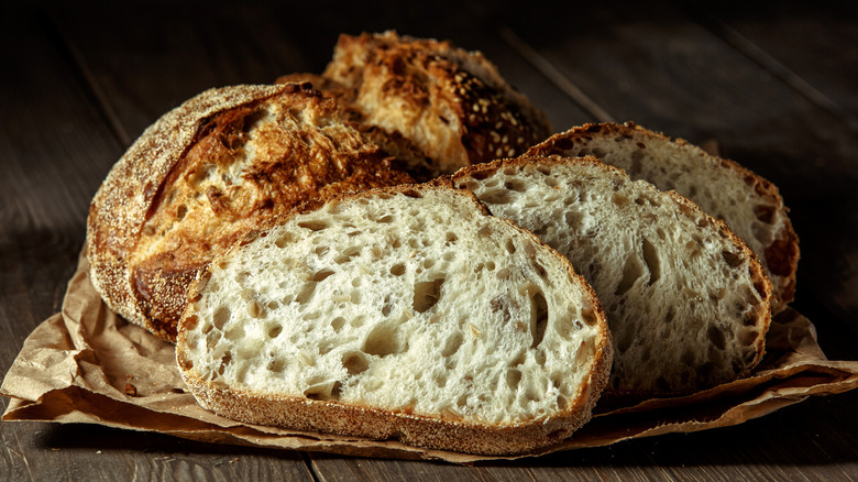 Homemade baked bread sliced into pieces