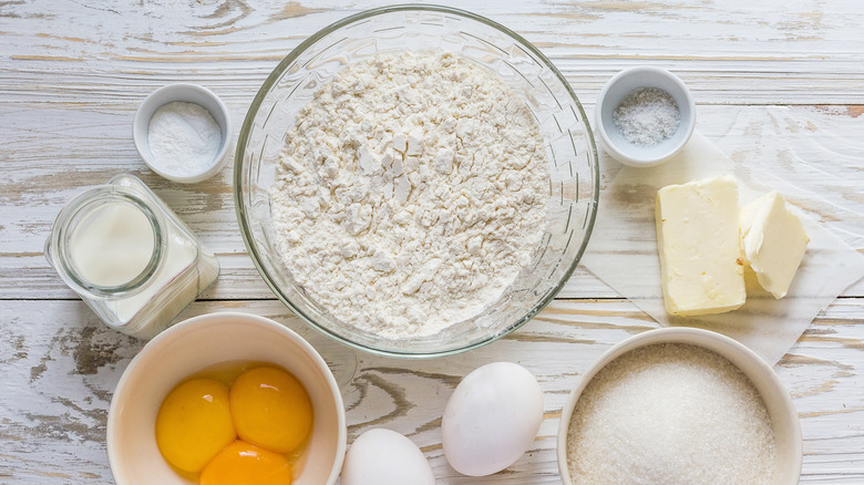 Bowl of flour with butter and eggs