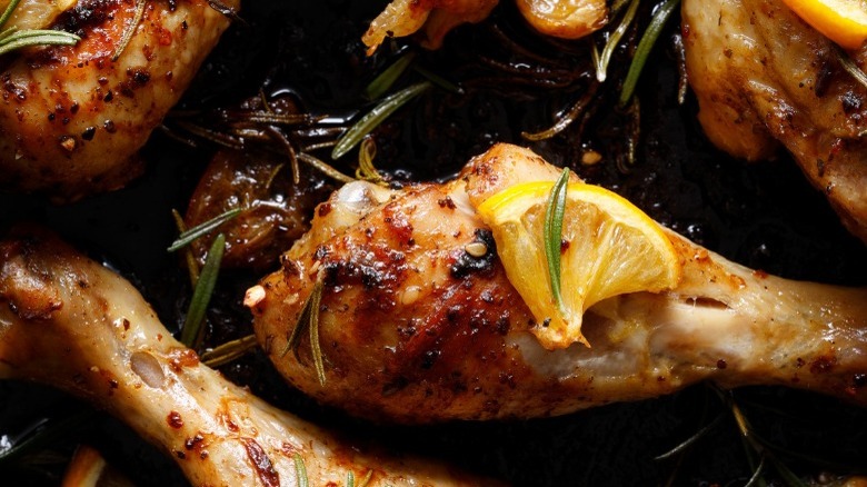 Chicken legs topped with lemon slices