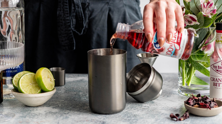 cranberry juice in cocktail shaker 