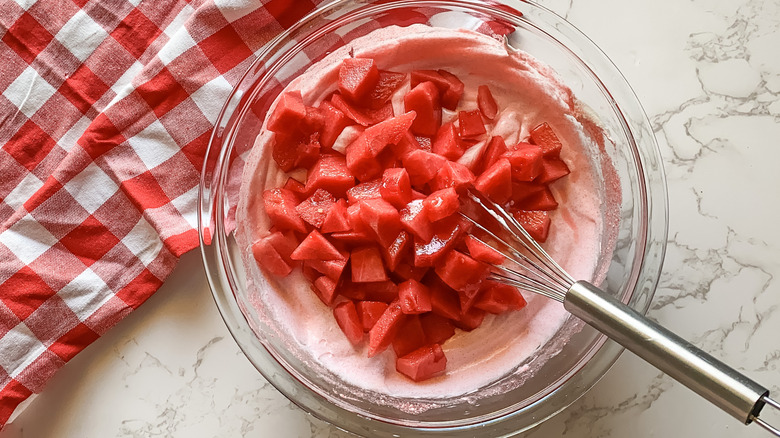 Watermelon fruit chunks in the whipped topping mix