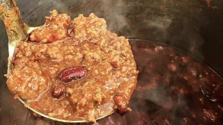 Oklahoma chili in a ladle