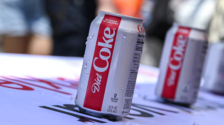 Cans of Diet Coke on a table