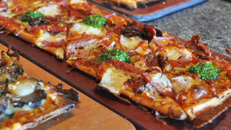 Flatbread pizzas on table