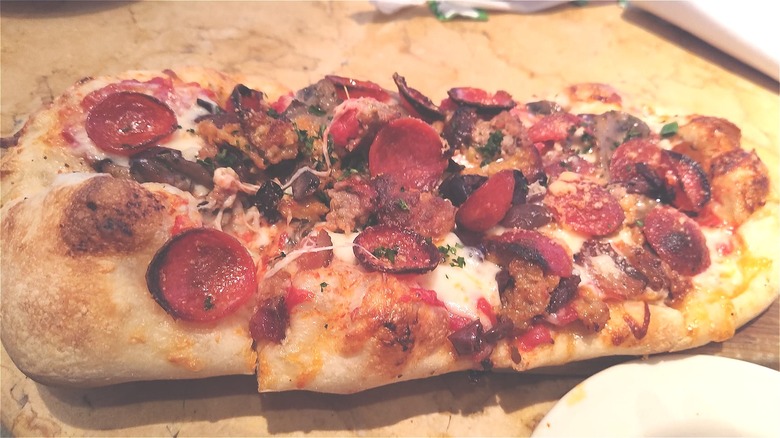 Pepperoni flatbread pizza on table