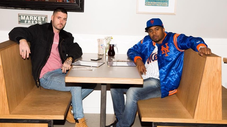 Nas and John Seymour at a Sweet Chick Booth