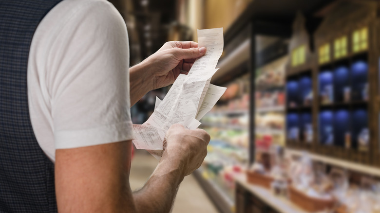 Shopper scanning receipts