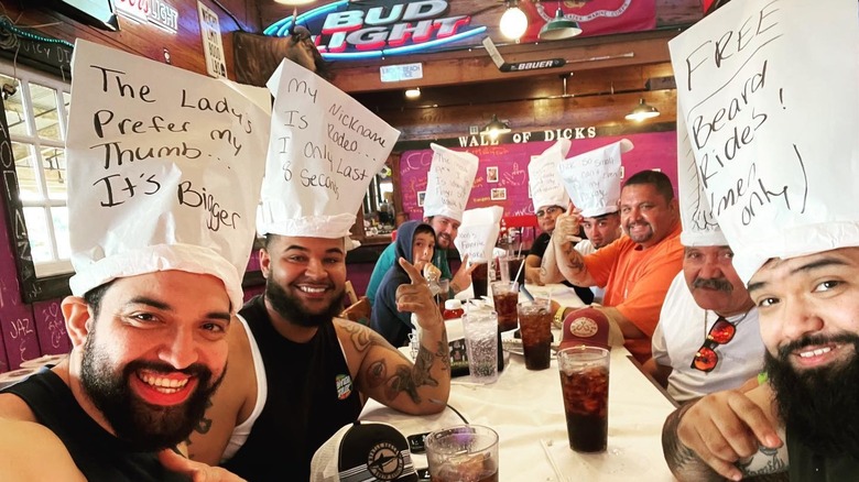 group wearing Dick's hats