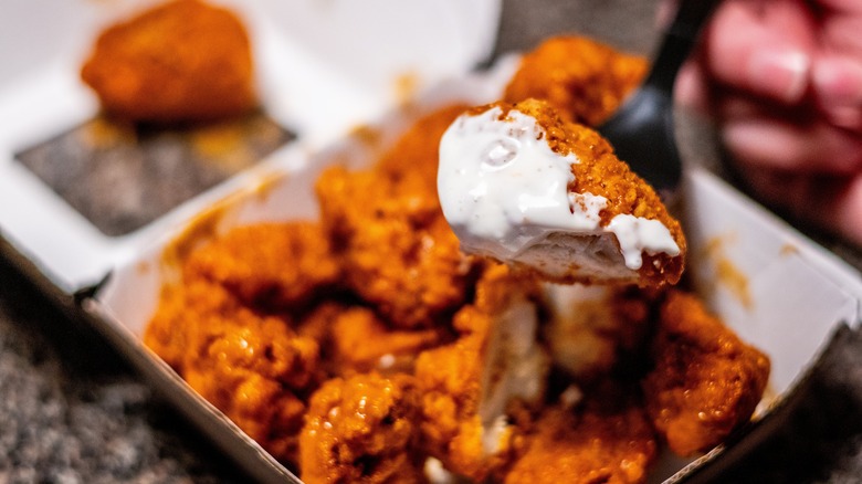 Buffalo wing dipped in ranch