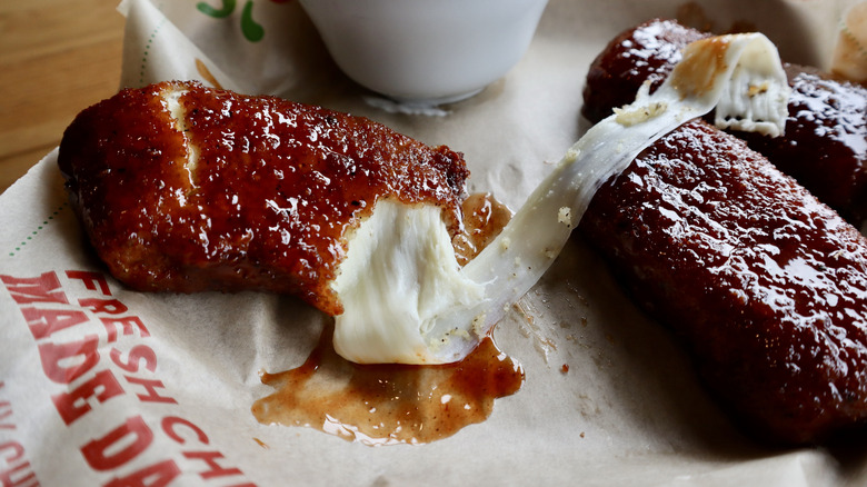 mozzarella stick with long cheese pull