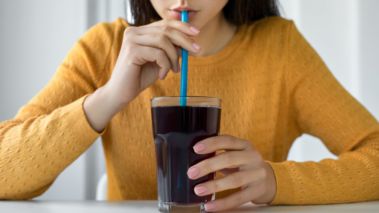 girl drinking with straw