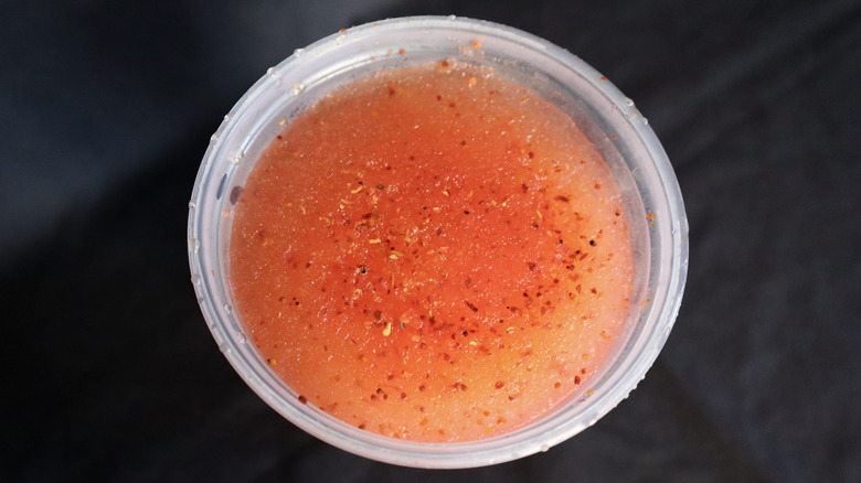 close-up of seasoning on red slush drink