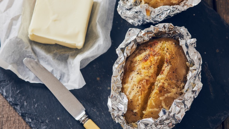 Foil-wrapped baked potatoes