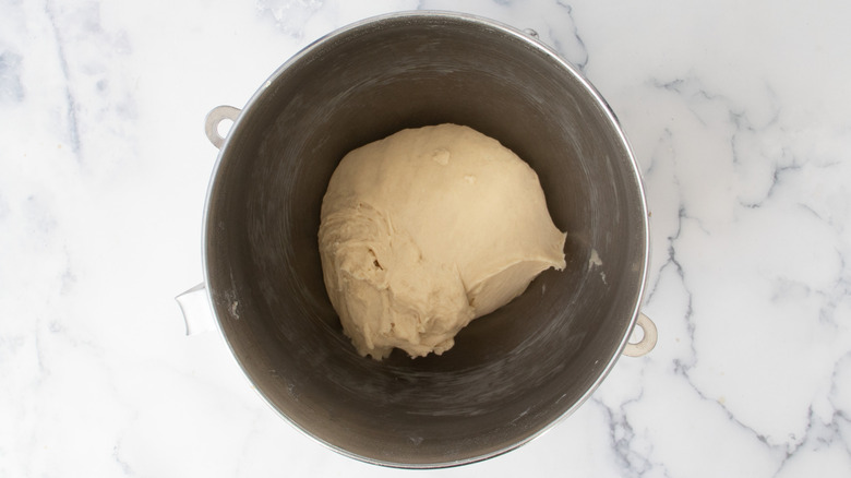 Kneaded dough in stand mixer bowl