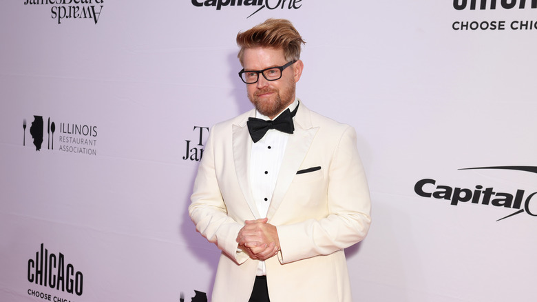 Richard Blais in a white suit