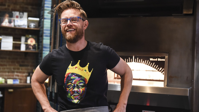 Richard Blais stands with hands on hips