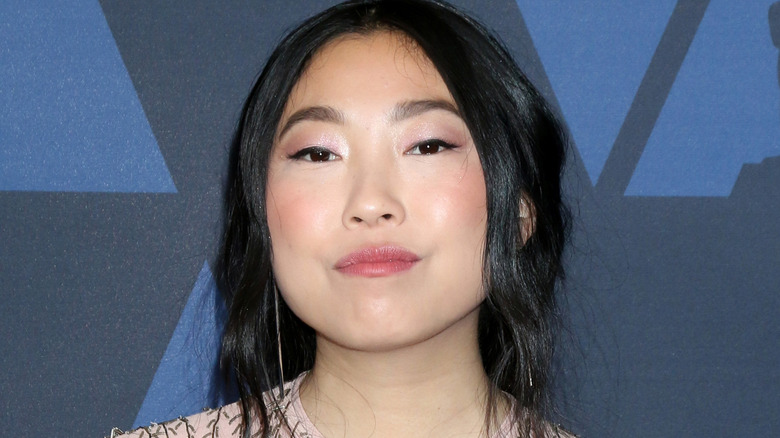 Awkwafina posing for press