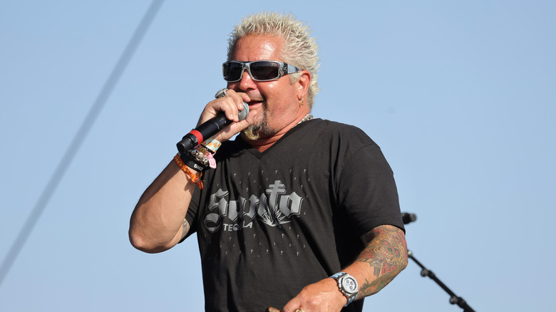 Guy Fieri talking outside