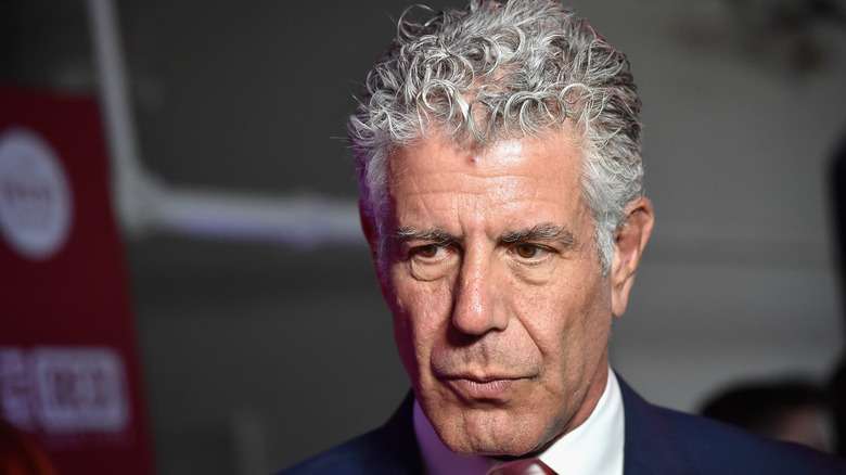 Anthony Bourdain looking down