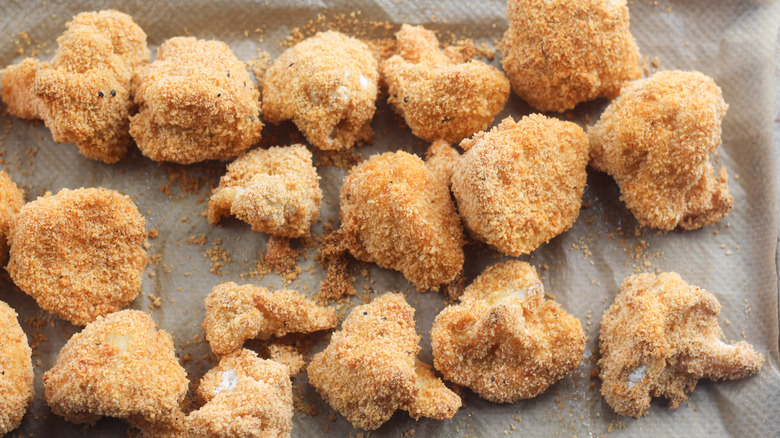 coated cauliflower on tray