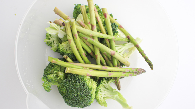 broccoli and asparagus in bowl