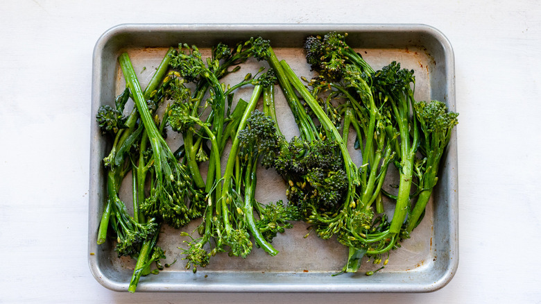 raw broccolini on pan